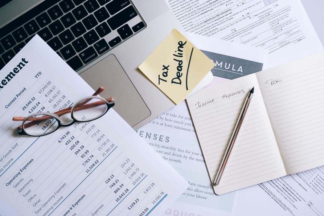 Month-end checklist with sales and supplier documents ready for review