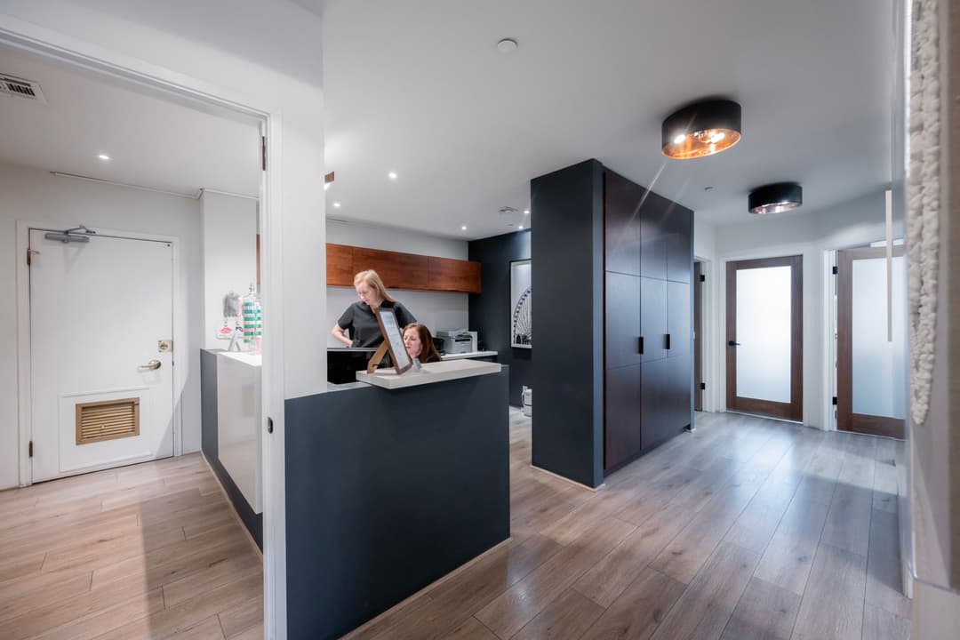 Service staff preparing a room during turnaround time between appointments