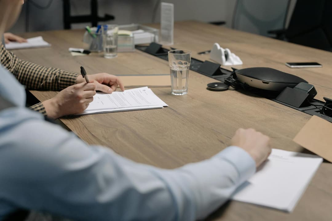 Purchasing team reviewing supplier purchase orders under separate company entities