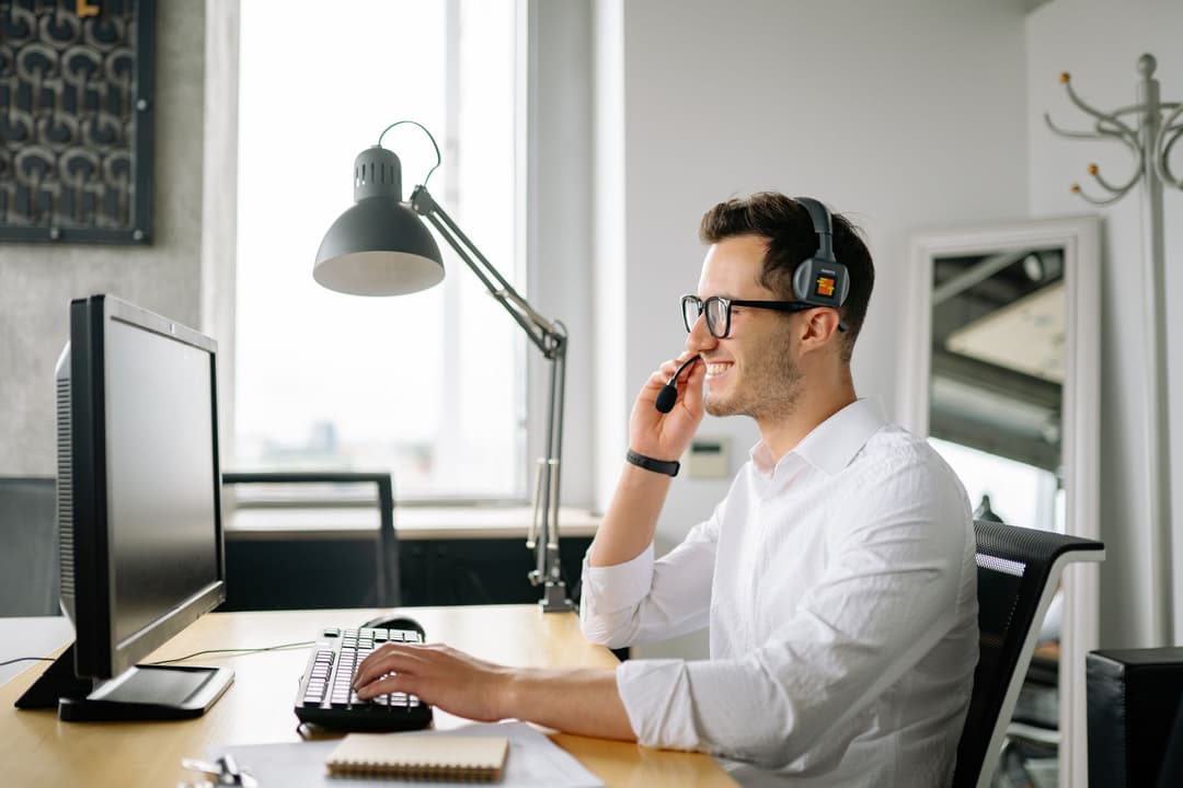 Customer service employee investigating a customer's query about two similar invoices