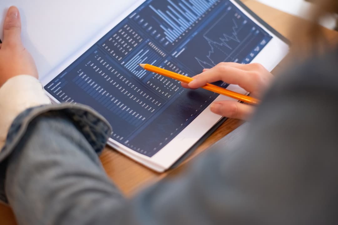 Finance team member tracking expense claim review and payment statuses