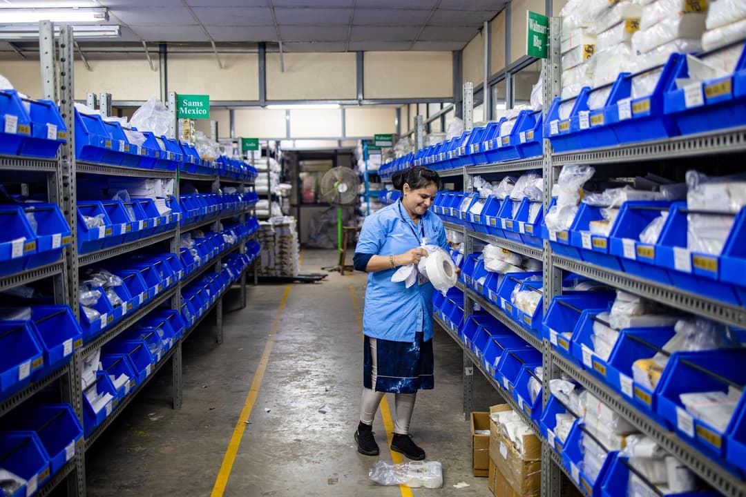 Warehouse worker completing a partial pick from the oldest available inventory lot