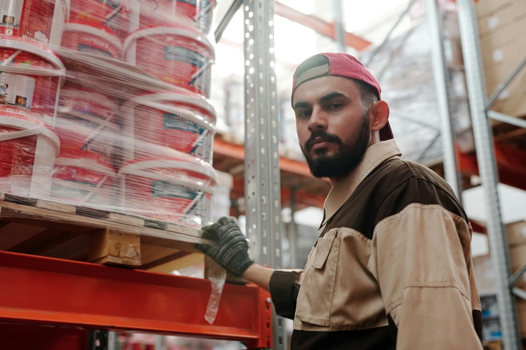 Warehouse staff recording stock entries for newly received inventory