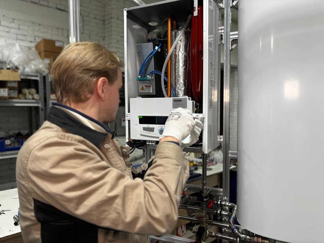 Technician providing an installation service after delivery of physical products