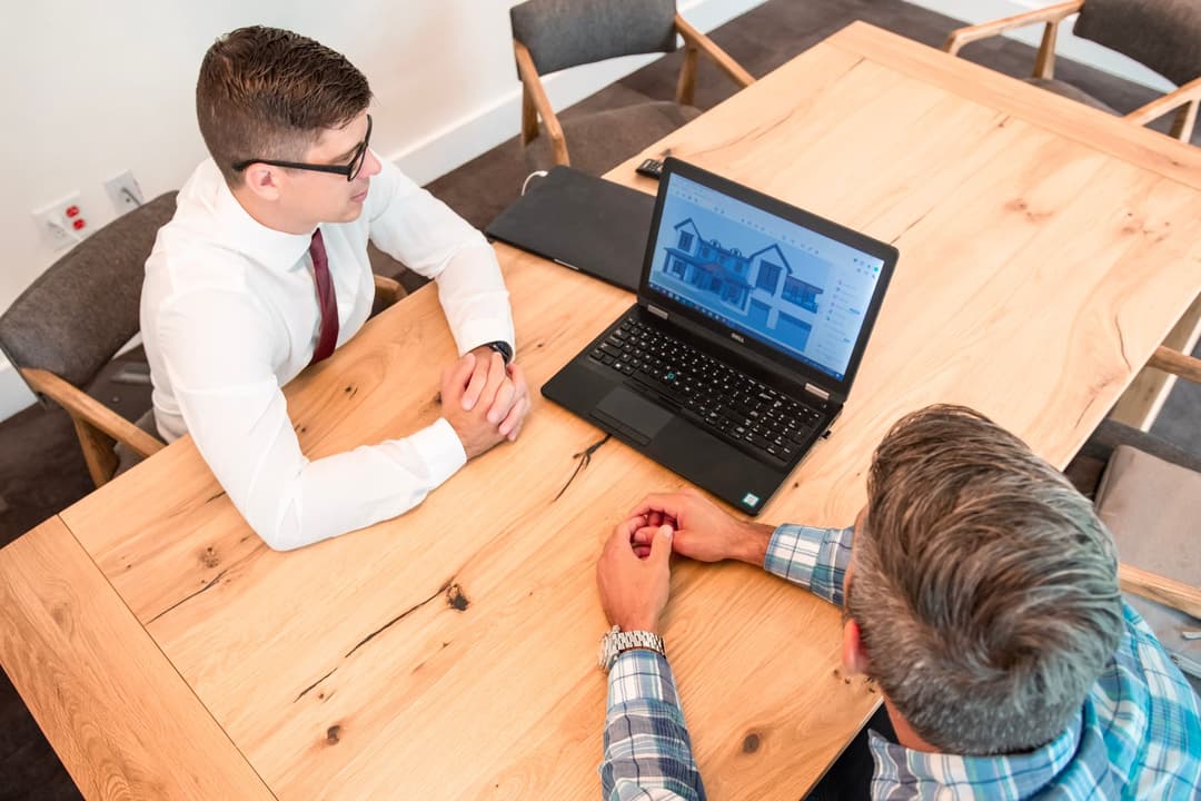 Consultant reviewing billable service hours with a business customer