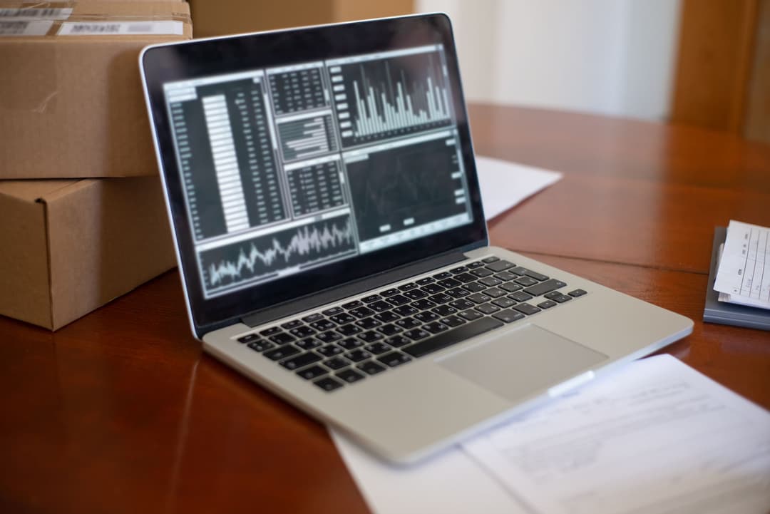 Inventory controller reviewing a stock-count adjustment against inventory records