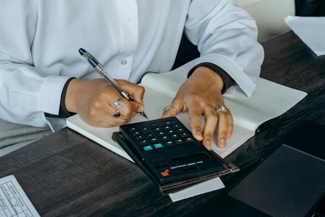 Team comparing an invoice and a credit note in a small business office
