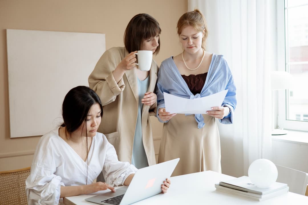 Procurement team checking supplier item codes on a purchase order
