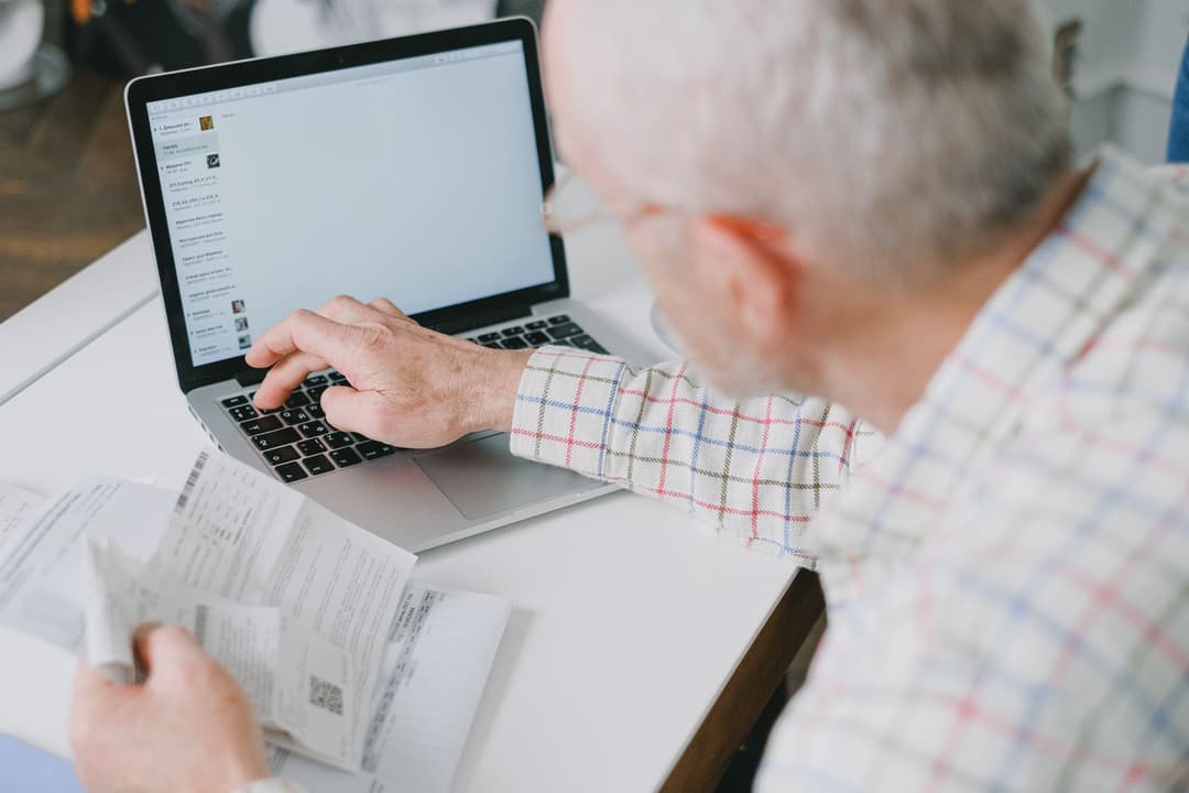 Finance team member matching a bank reference to an invoice
