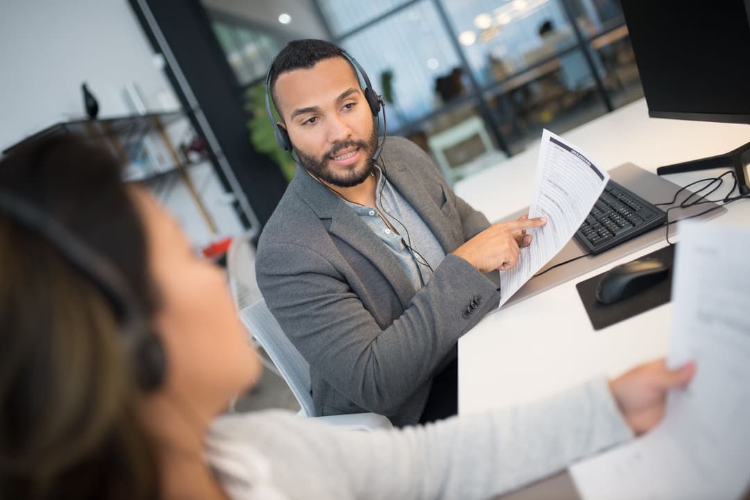 Sales executive comparing a standard product price with a special quotation price