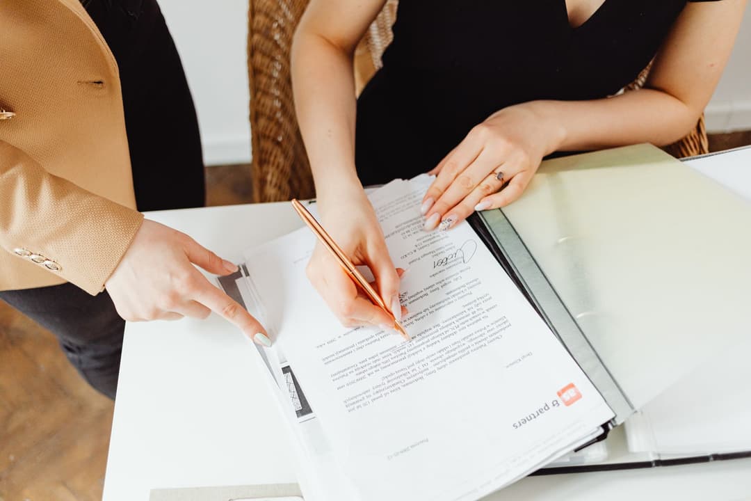 Team reviewing approved quotation details before preparing the next sales document