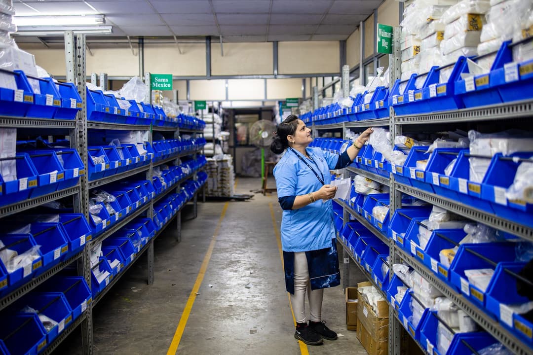 Operations manager checking an urgent stock request against inventory and order history