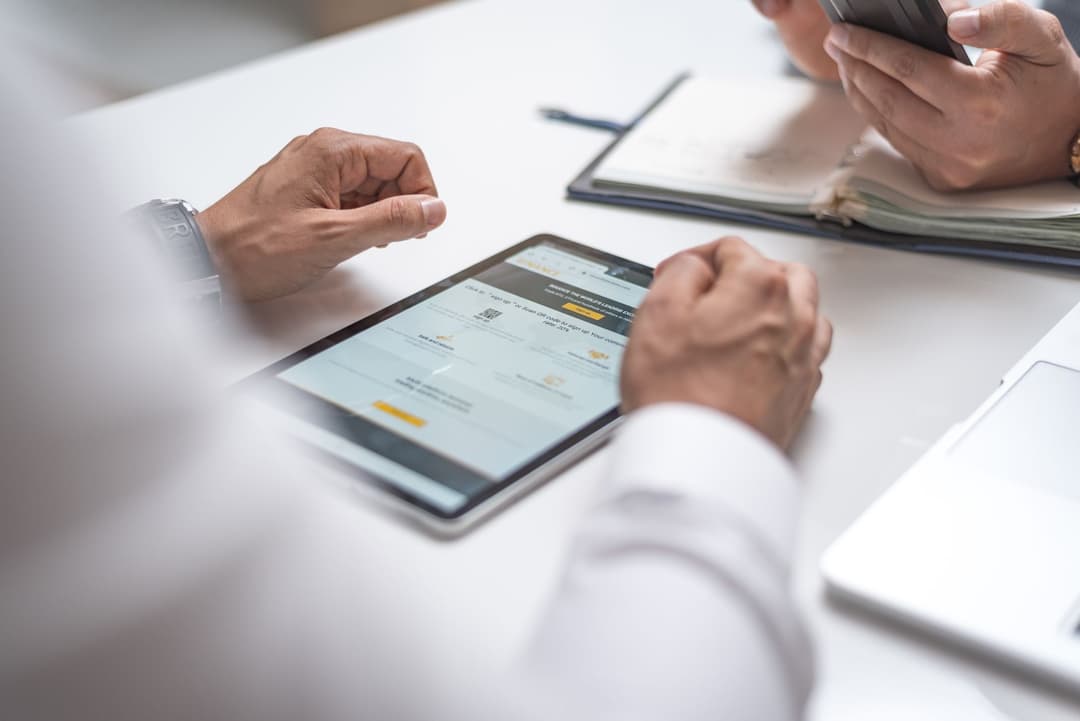 Purchasing coordinator reviewing outstanding supplier refund follow-up status