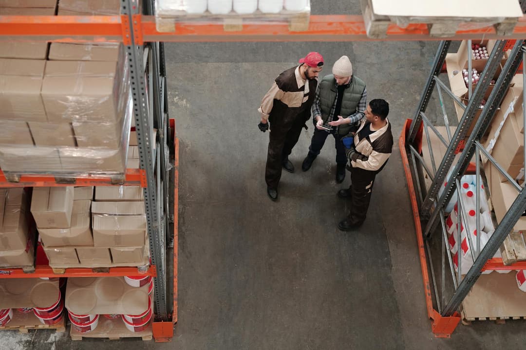 Warehouse team checking received goods at the loading area
