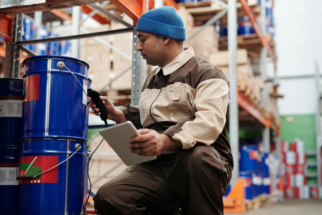 Inventory controller completing a stock count correction check