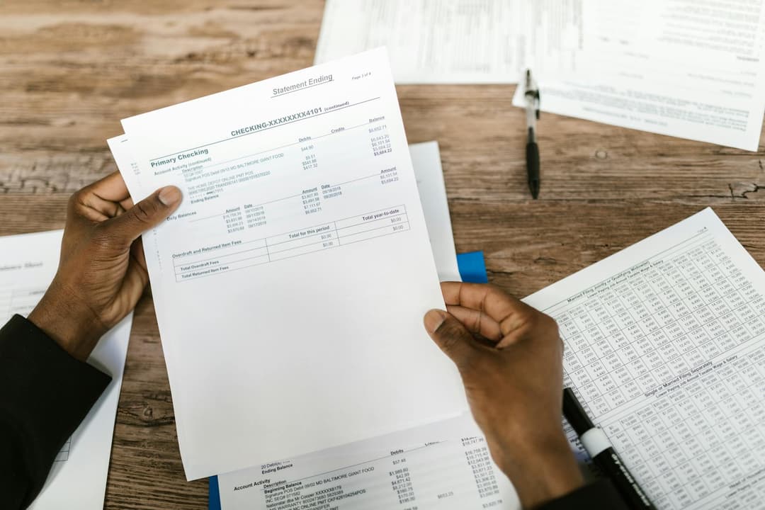 Finance staff matching supplier invoices to purchase orders and due dates