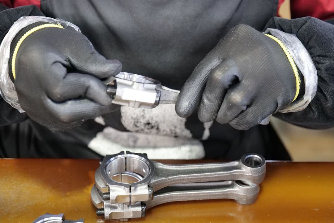Buyer checking supplier product codes for two similar fittings with different sizes
