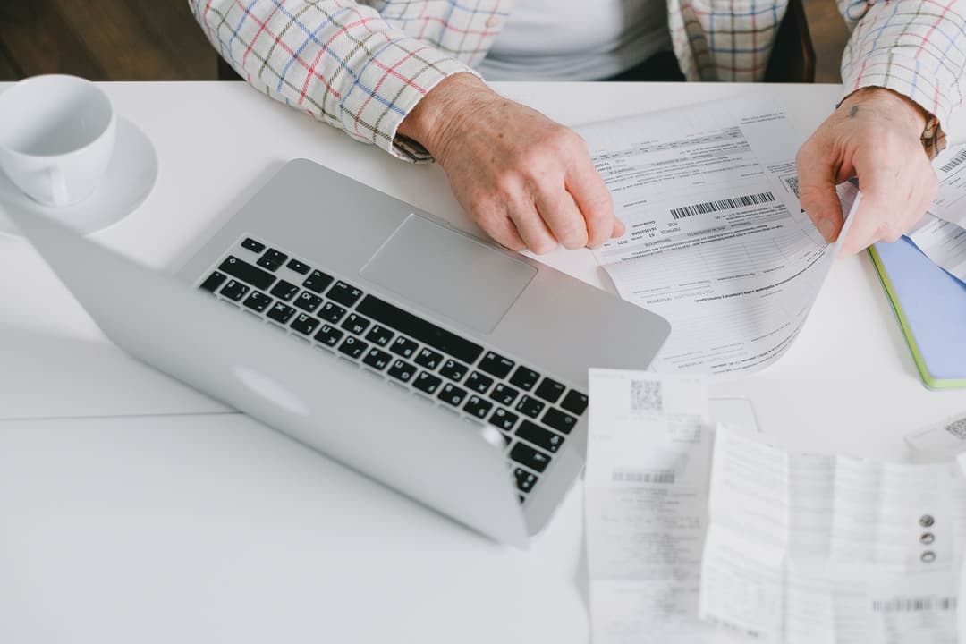 Finance admin reviewing company expense documents
