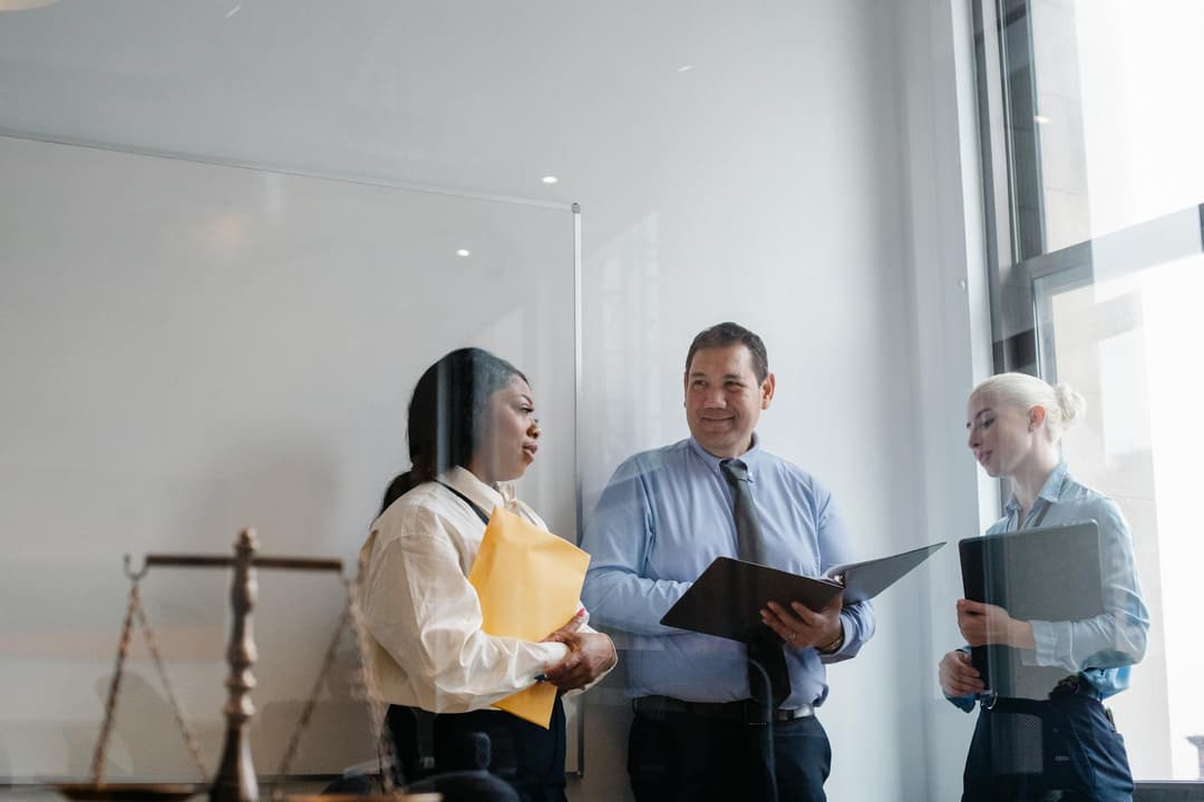 Shared staff managing finance tasks across separate group companies
